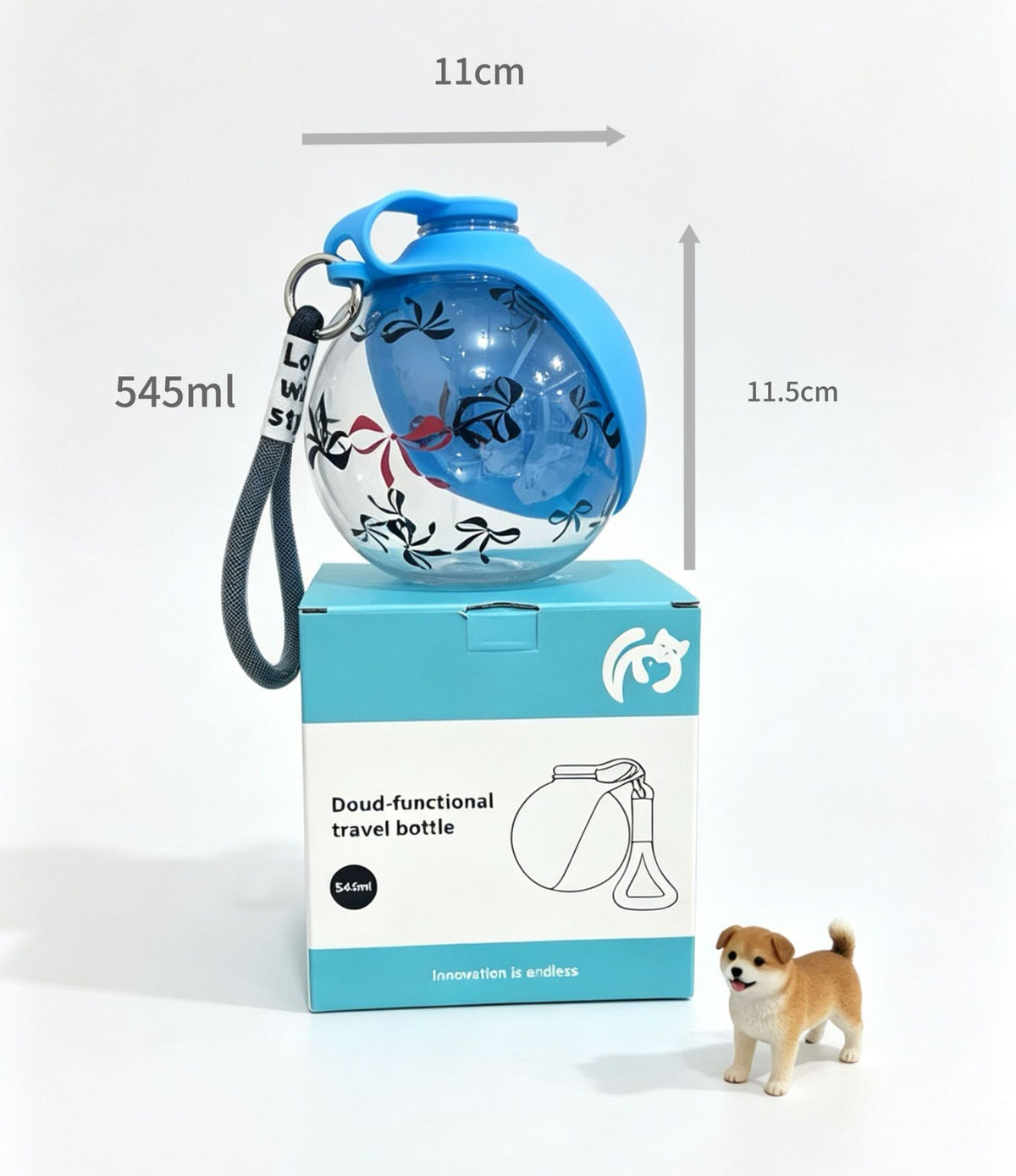 Dog drinking water from Pawlyn portable bottle outdoors