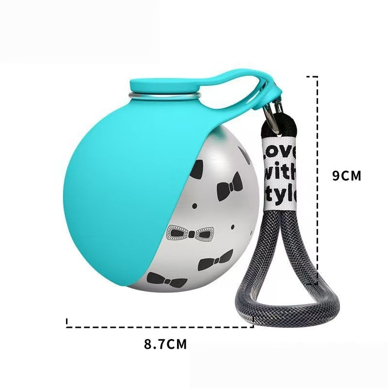 Pawlyn dog water bottle attached to a leash for hands-free walks