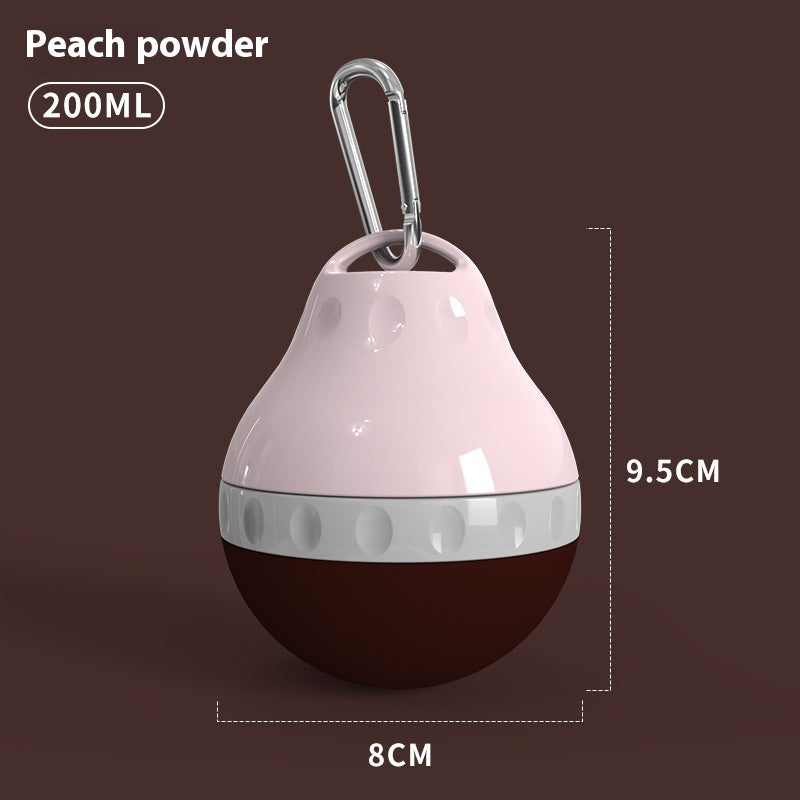 Pawlyn foldable water cup clipped to a bag or leash